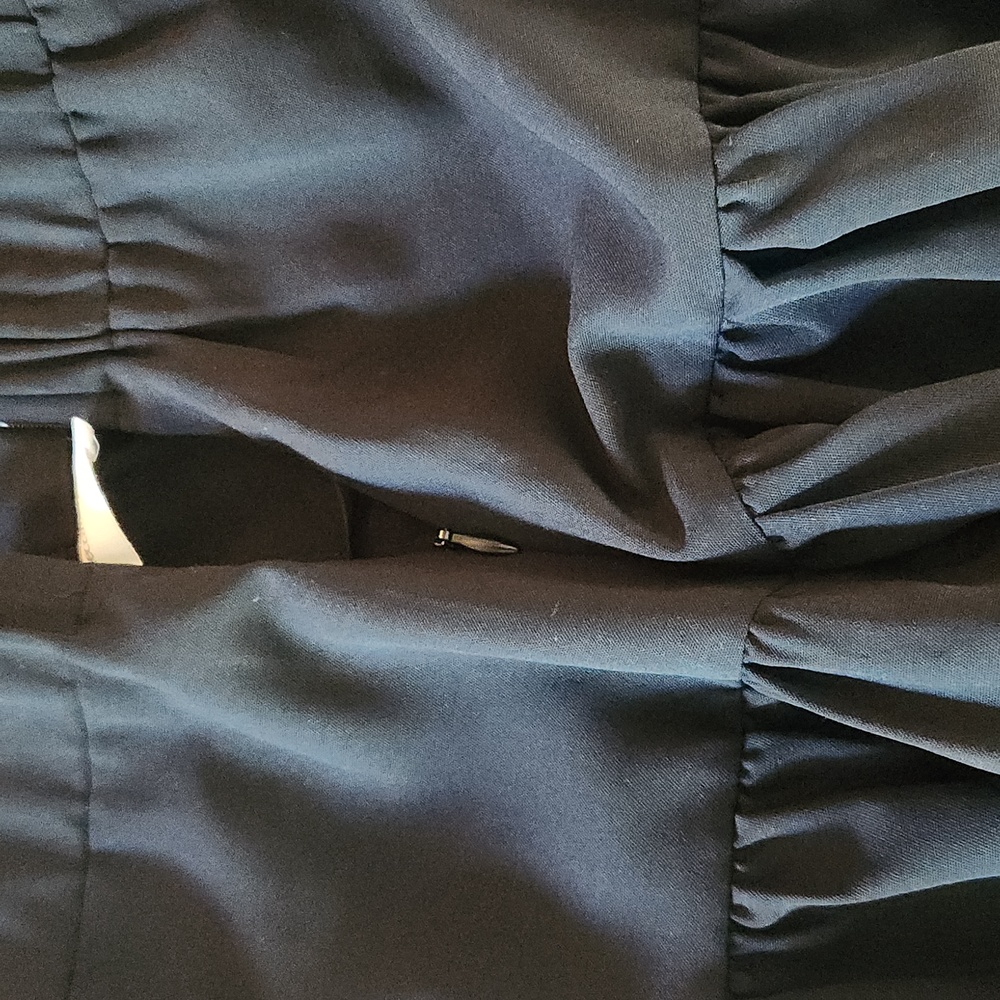 Cute black mini skirt by Impeccable Pig. Zips up the side, great condition! - Picture 4 of 9